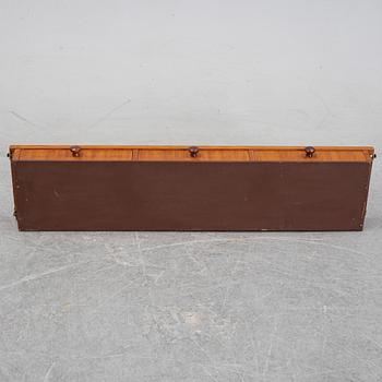 Nils Strinning, A 1950's-60's teak veneered shelf with brackets.
