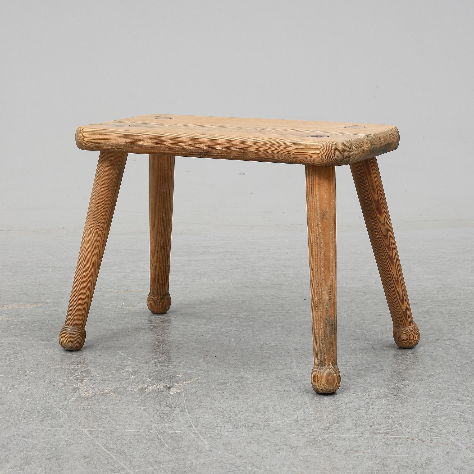 A pine stool, second half of the 20th century.