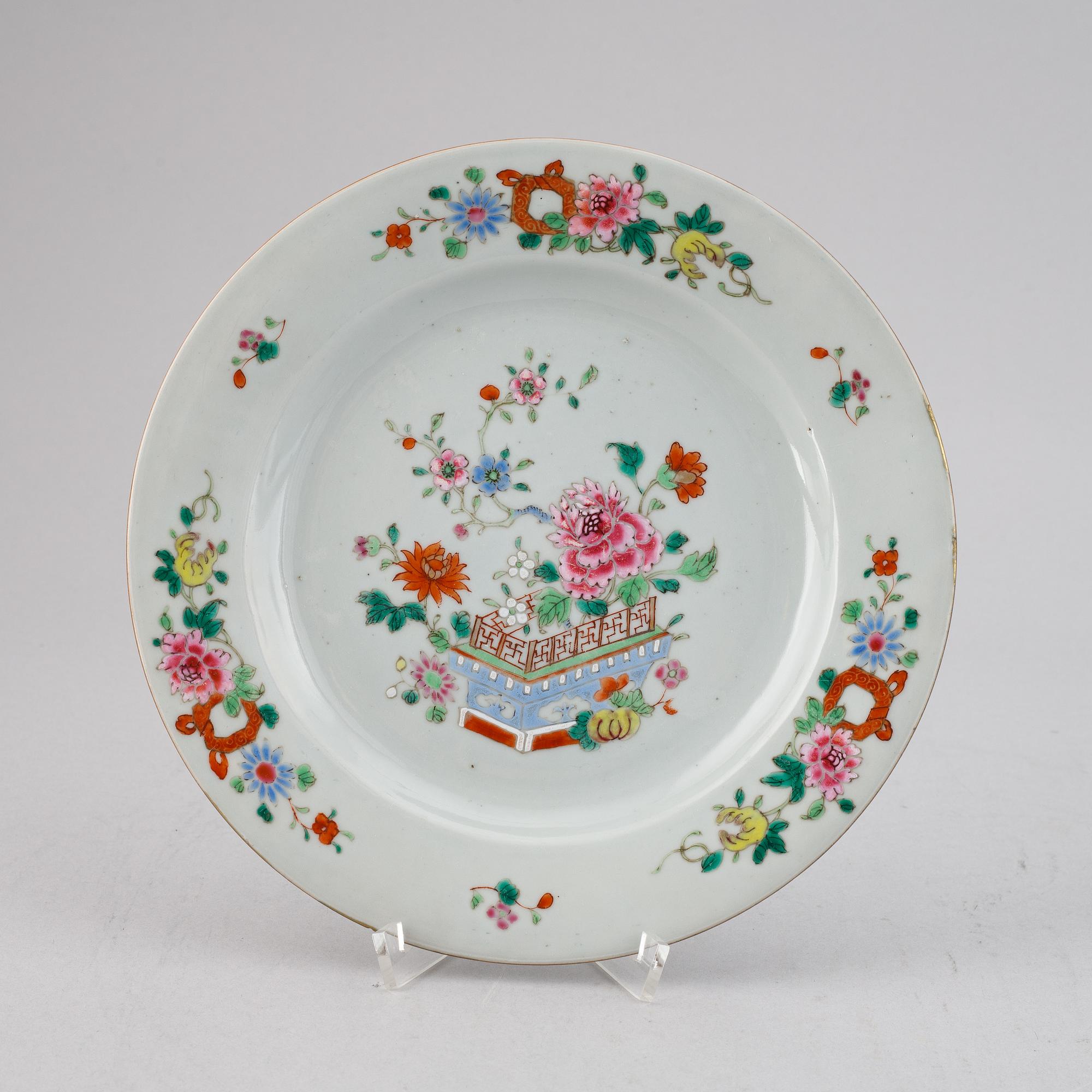 Eight famille rose export porcelain plates, Qing dynasty, Qianlong (1736-95).