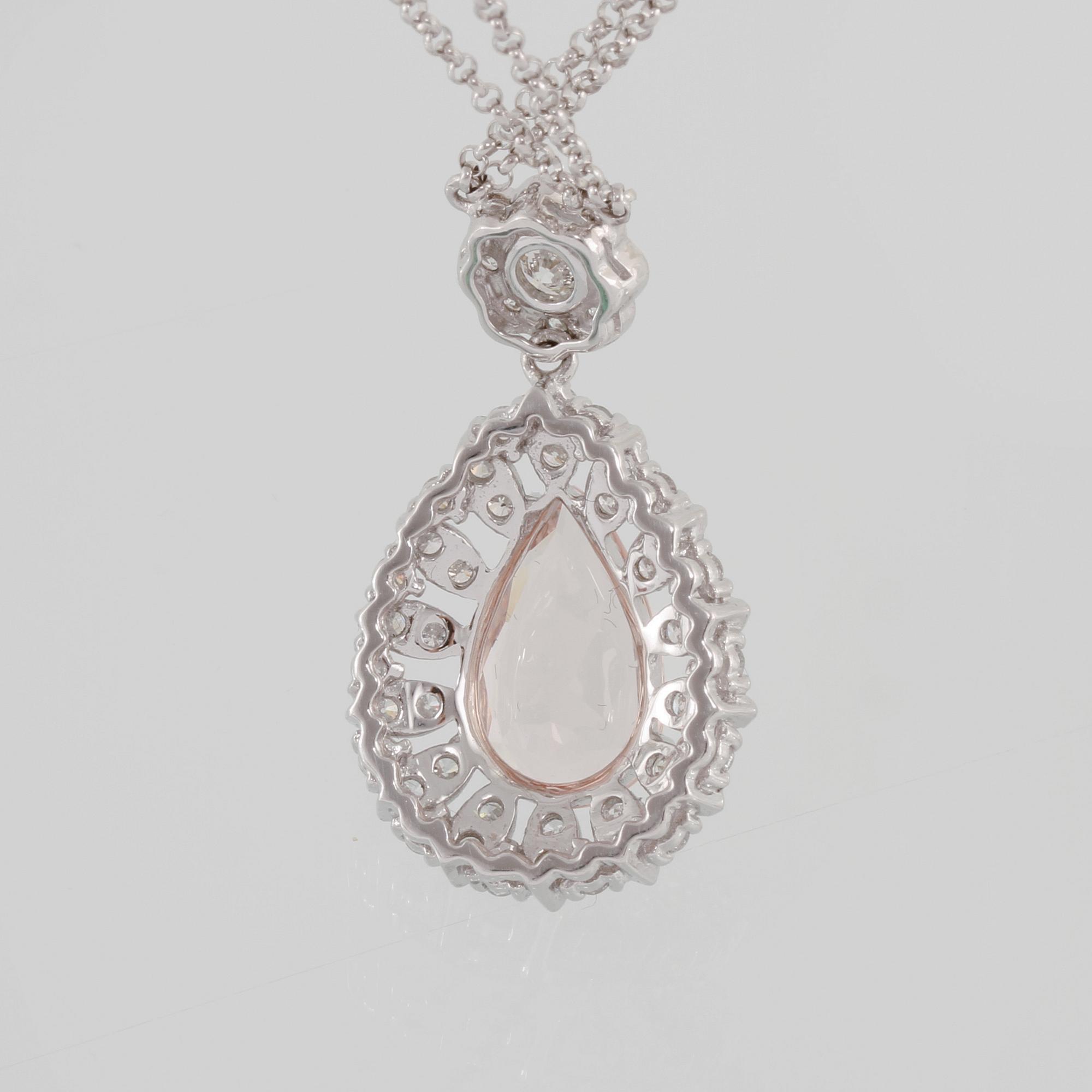 HÄNGE, 18K vitguld med droppslipad morganit 2.54 ct samt briljantsliapde diamanter 1.16 ct. Vikt 7,1 gram.