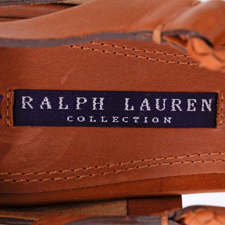 RALPH LAUREN, a pair of brown leather sandals. Size US 9.