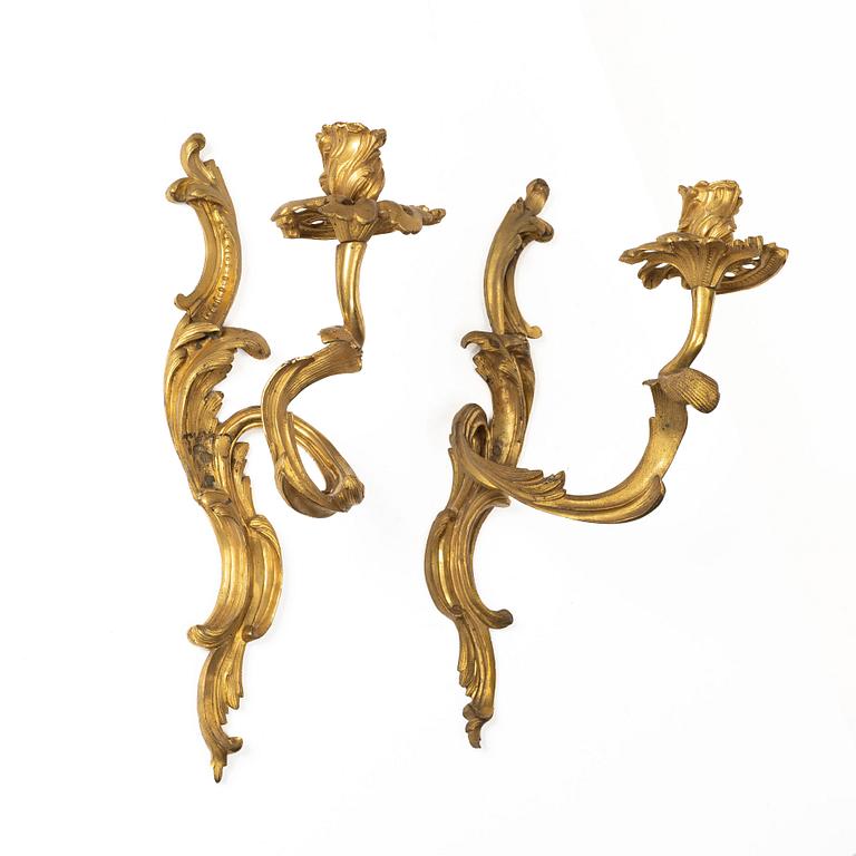 A pair of Rococo-style appliques, France, circa 1900.