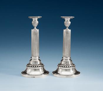 895. A pair of Swedish 19th cent silver candlesticks, makers mark of Gustaf Möllenborg, Sthlm 1895 and J.E. Torsk, Sthlm 1893.