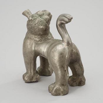 An Anna Petrus pewter bottle in the shape of a lion, Herman Bergman, Stockholm 1923-25.