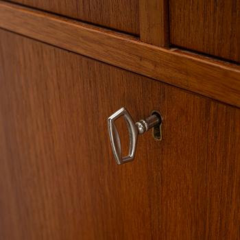 Three teak-veneered cabinets, 1960's.