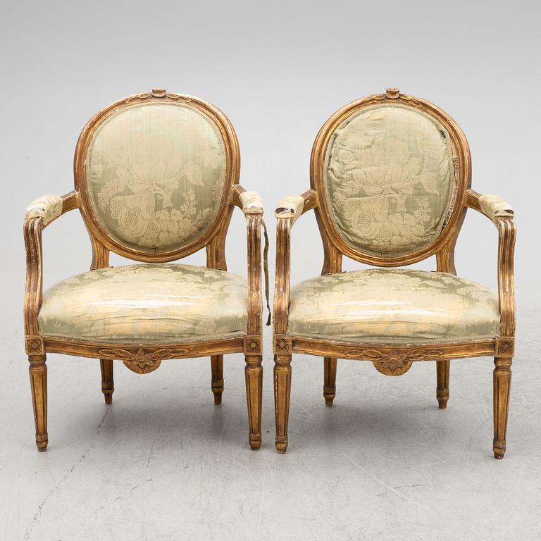 A pair of Gustavian style armchairs, 19th century.