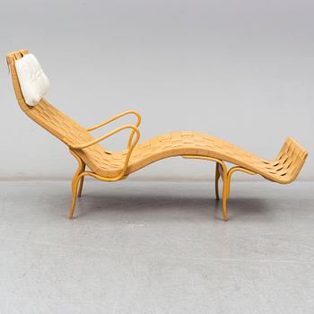 BRUNO MATHSSON, a 'Pernilla' beech recliner from Firma Karl Mathsson, Värnamo, 1980.