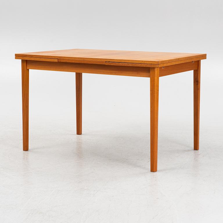 A teak dining table 1960s.