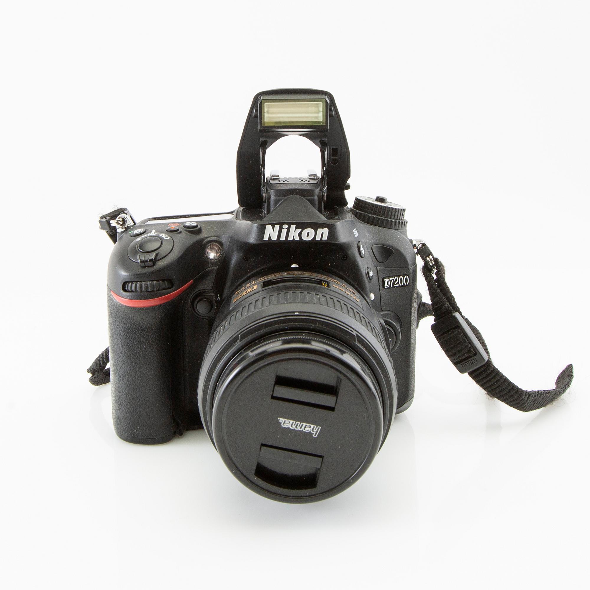 Camera Nikon D7200 along with 5 lenses and a bag.