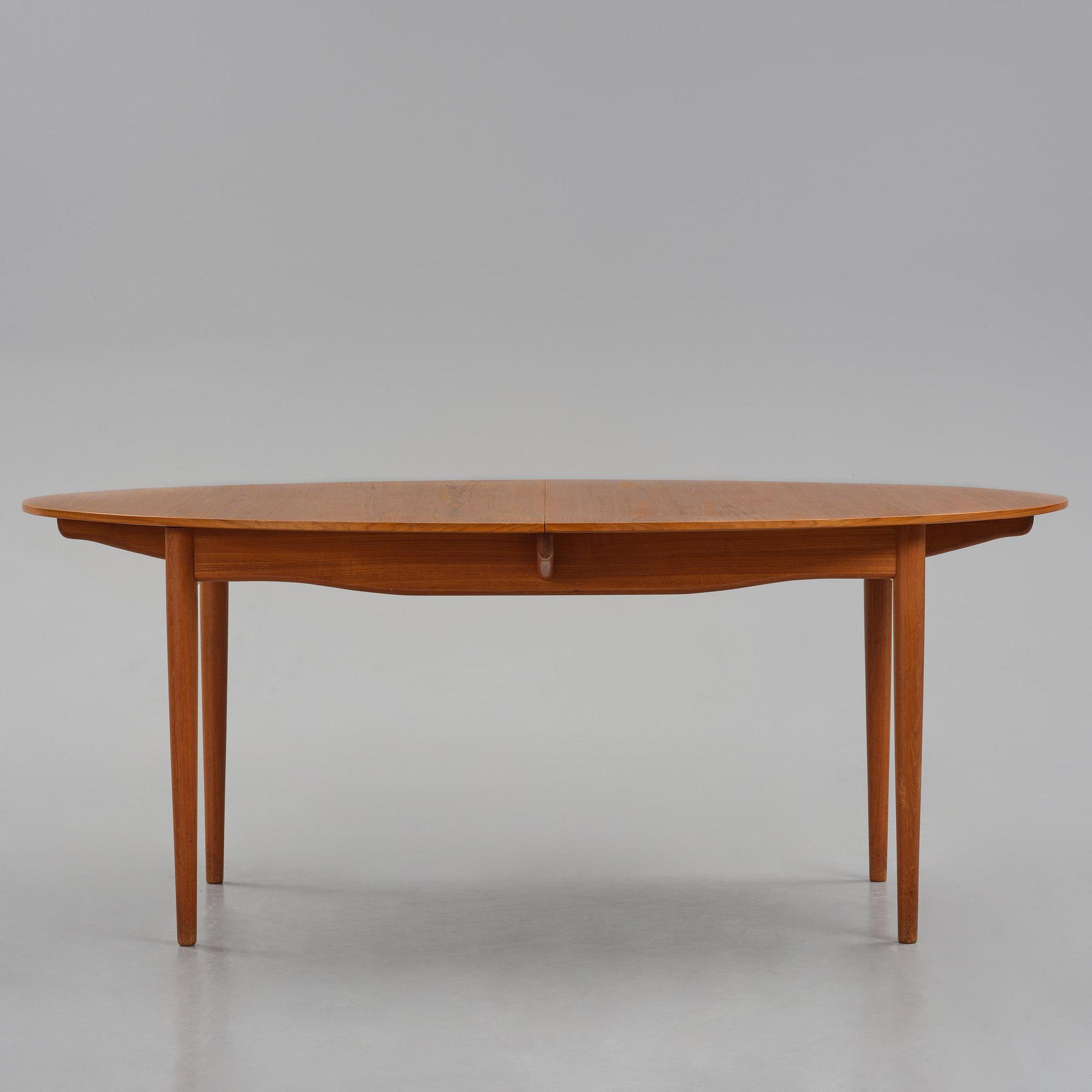 Finn Juhl, a teak dining table, Niels Vodder, Denmark, 1960s.
