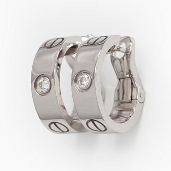 Cartier, Korvakorut, "Love", 18K valkokultaa, briljanttihiottuja timantteja.