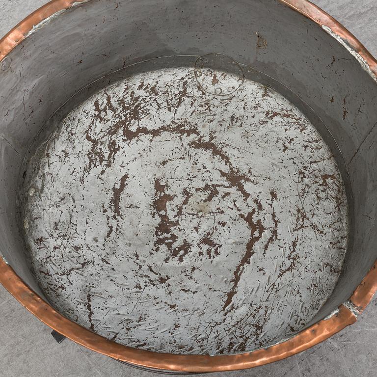 A copper pot, 19th Century.