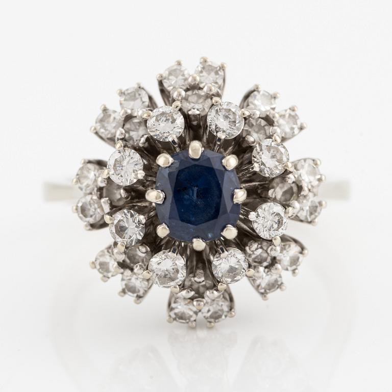 Ring, 18K white gold with sapphire and diamonds.