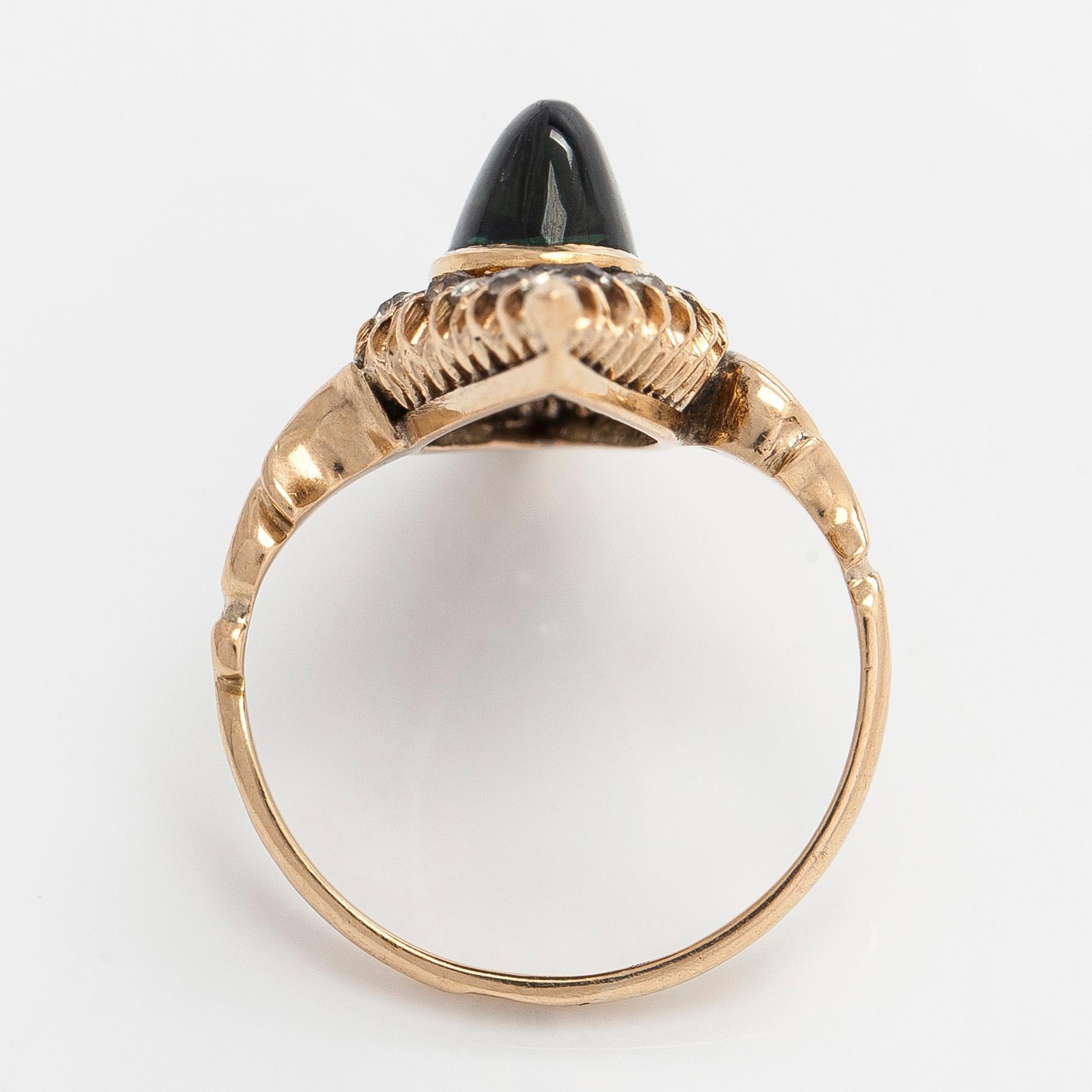 Ring in 14K gold, old-cut diamonds and a sapphire, cyrillic assay mark AP, Russia, around year 1900.