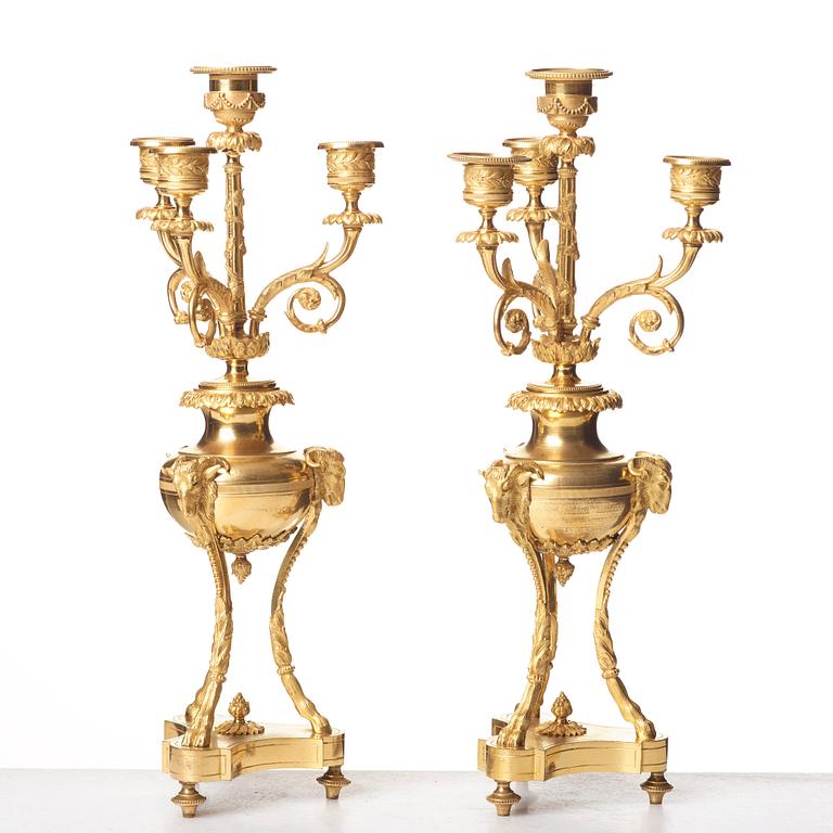 A pair of French Louis XVI-style four-light candelabra, second half of the 1800's.