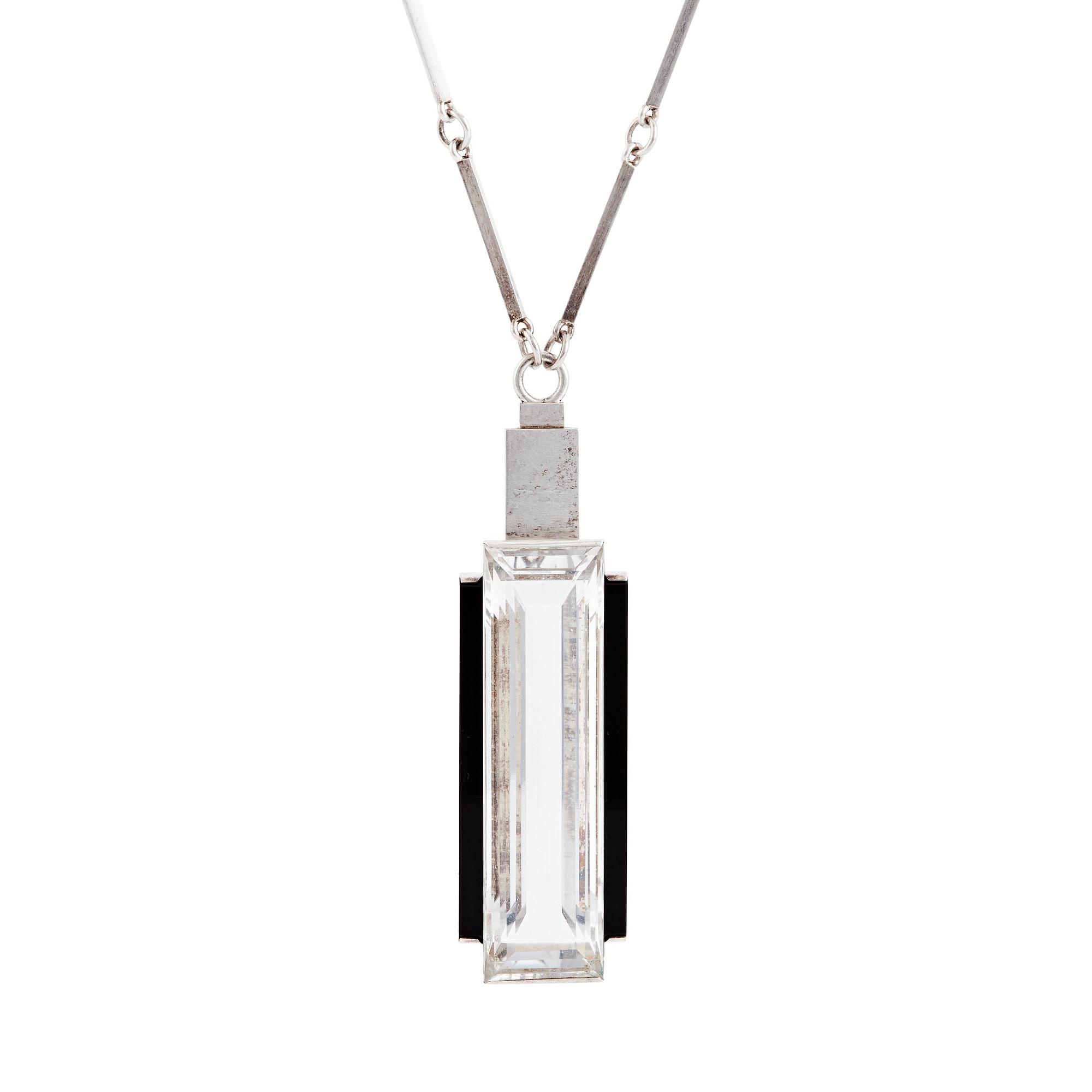 Wiwen Nilsson, a sterling silver necklace with a rock crystal and onyx pendant, Lund 1939.