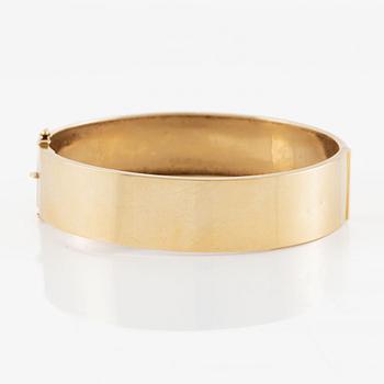 A bangle 18K gold.