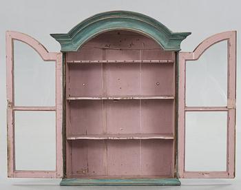 a folklore wall cabinet from Ljusdal Hälsingland in the 18th-/19th century.