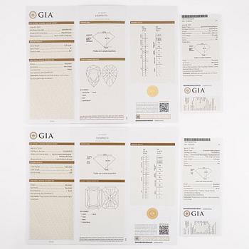 Crossover ring, 18K white gold set with pear-shaped and emerald-cut diamonds. Accompanied by GIA report.