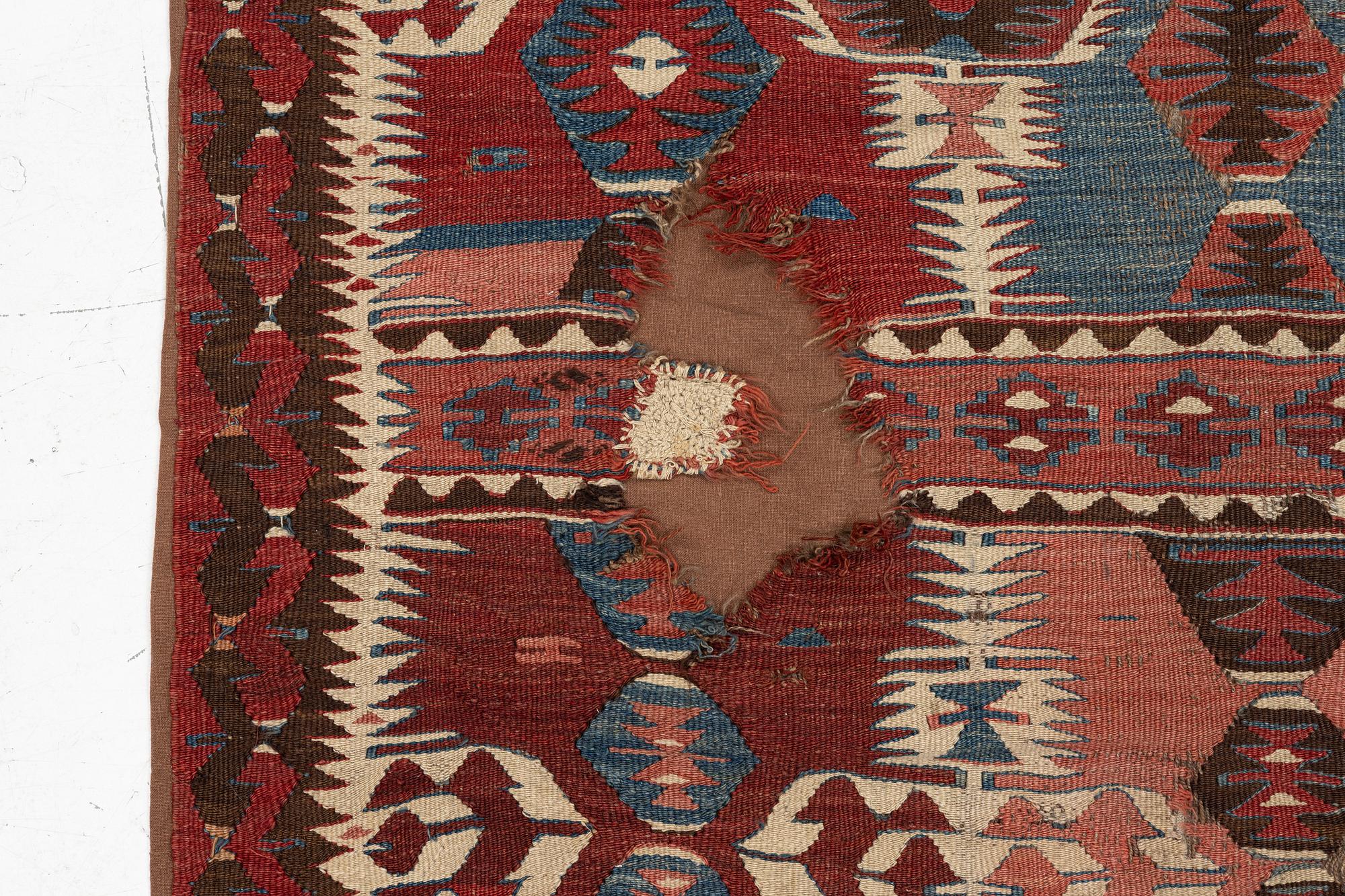 An Antique Mut kilim, central Anatolia, c. 250 x 130 cm.