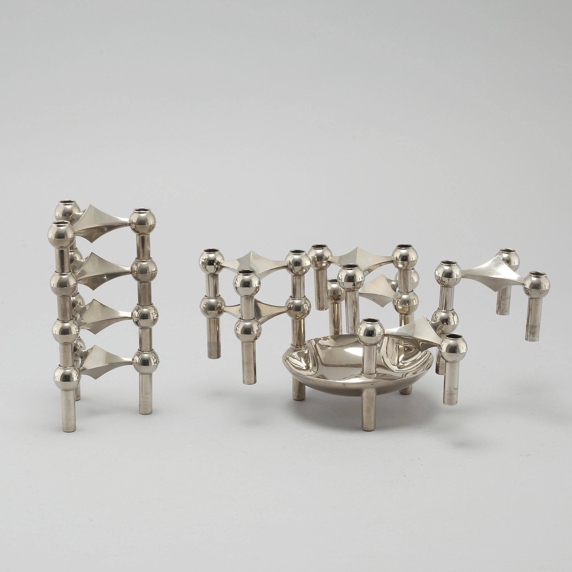 A metal candlestick with eleven parts by Ceasar Stoffi and Fritz Nagel, second half of the 20th century.