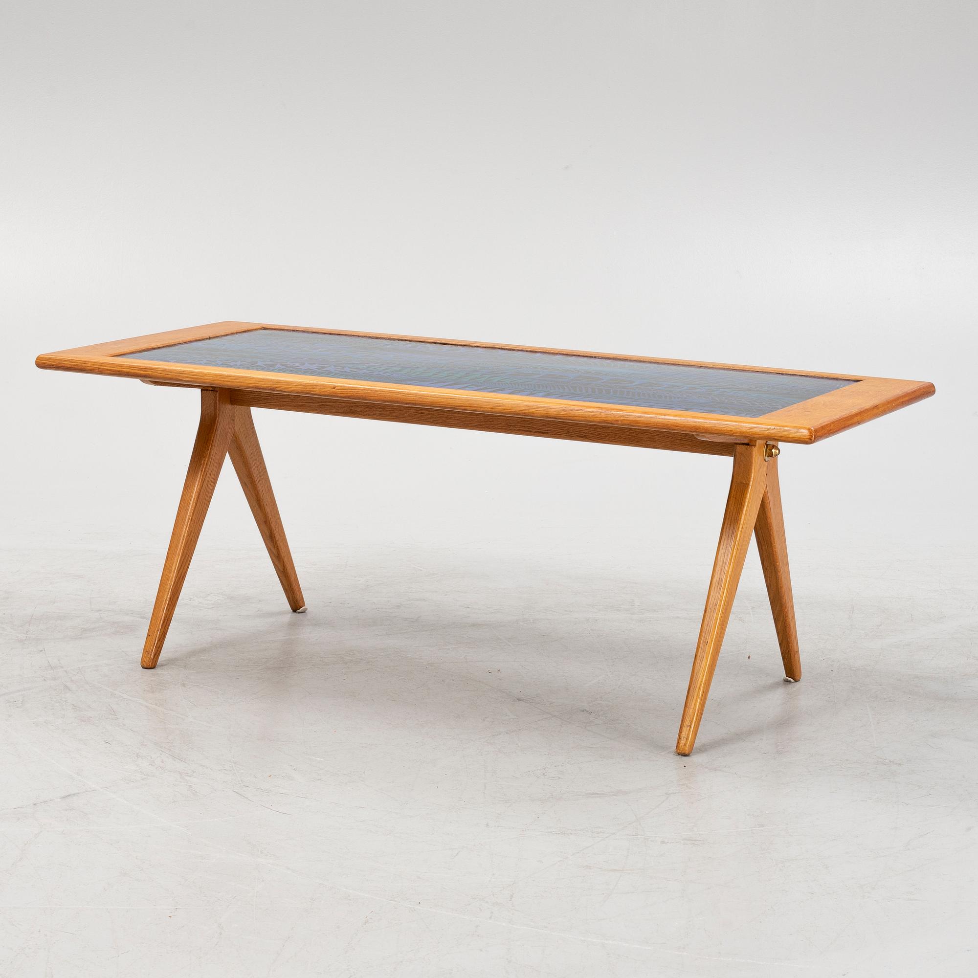 Stig Lindberg & David Rosén, an oak and enamel coffee table from Nordiska Kompaniet and Gustavsberg, 1950's.