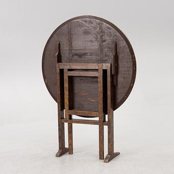 A folding table, 19th Century.