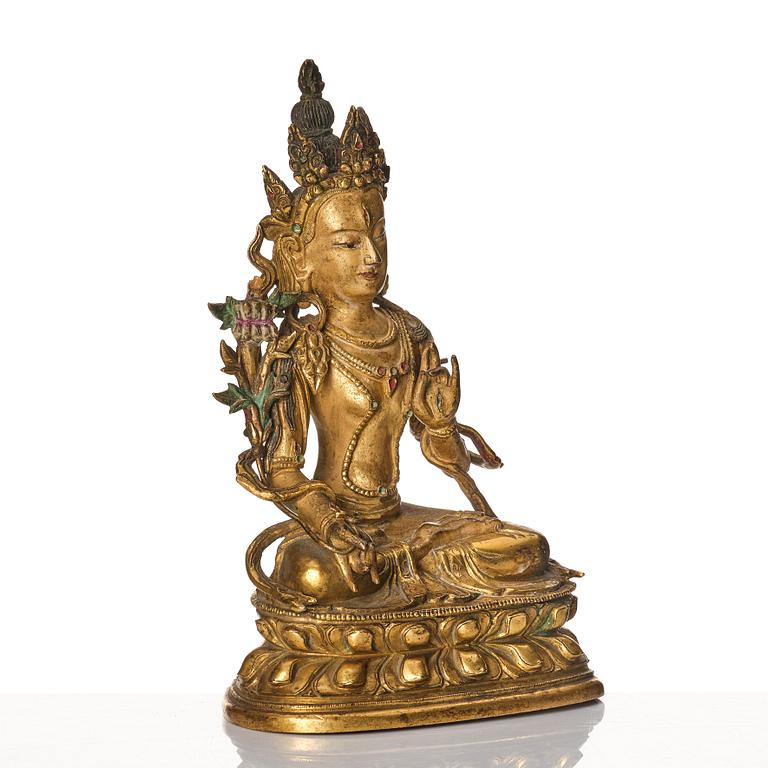 A Tibeto-Chinese/Mongolian gilt bronze figure of White Tara, 18th Century.