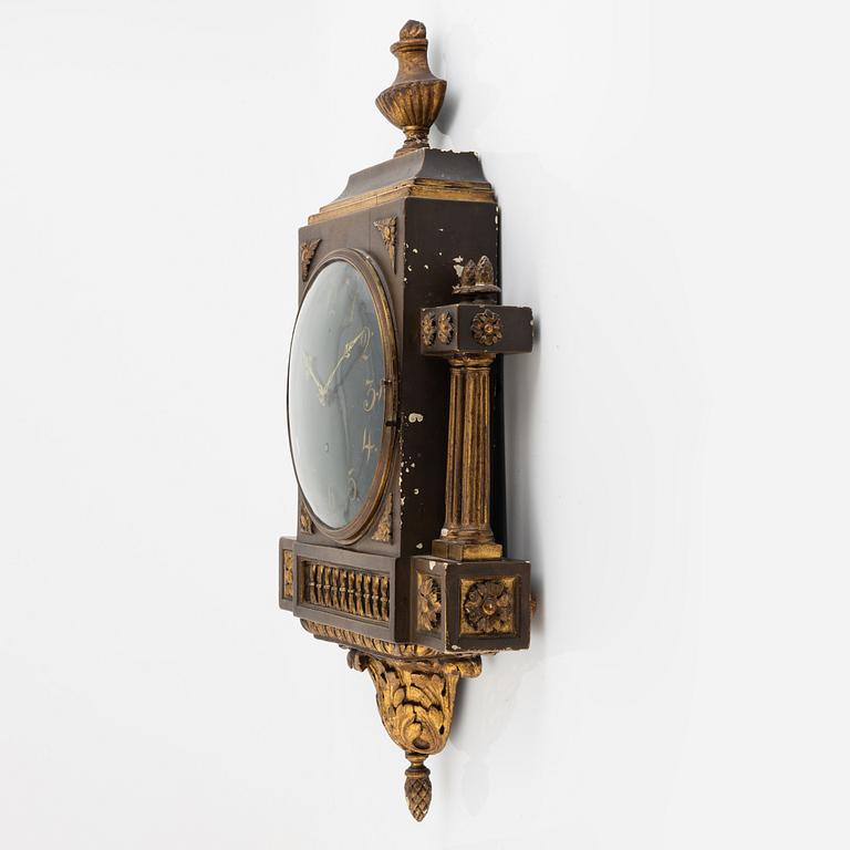 A Gustavian wall clock, 19th century.