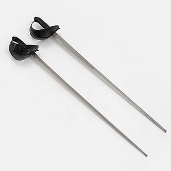 A Swedish pair of military practice swords 1886 pattern.