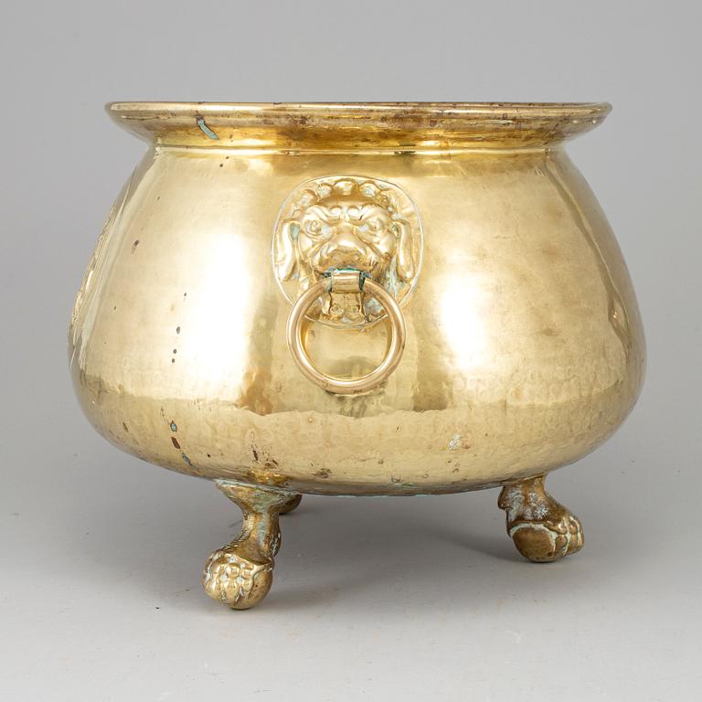 A 19th century brass flower pot.