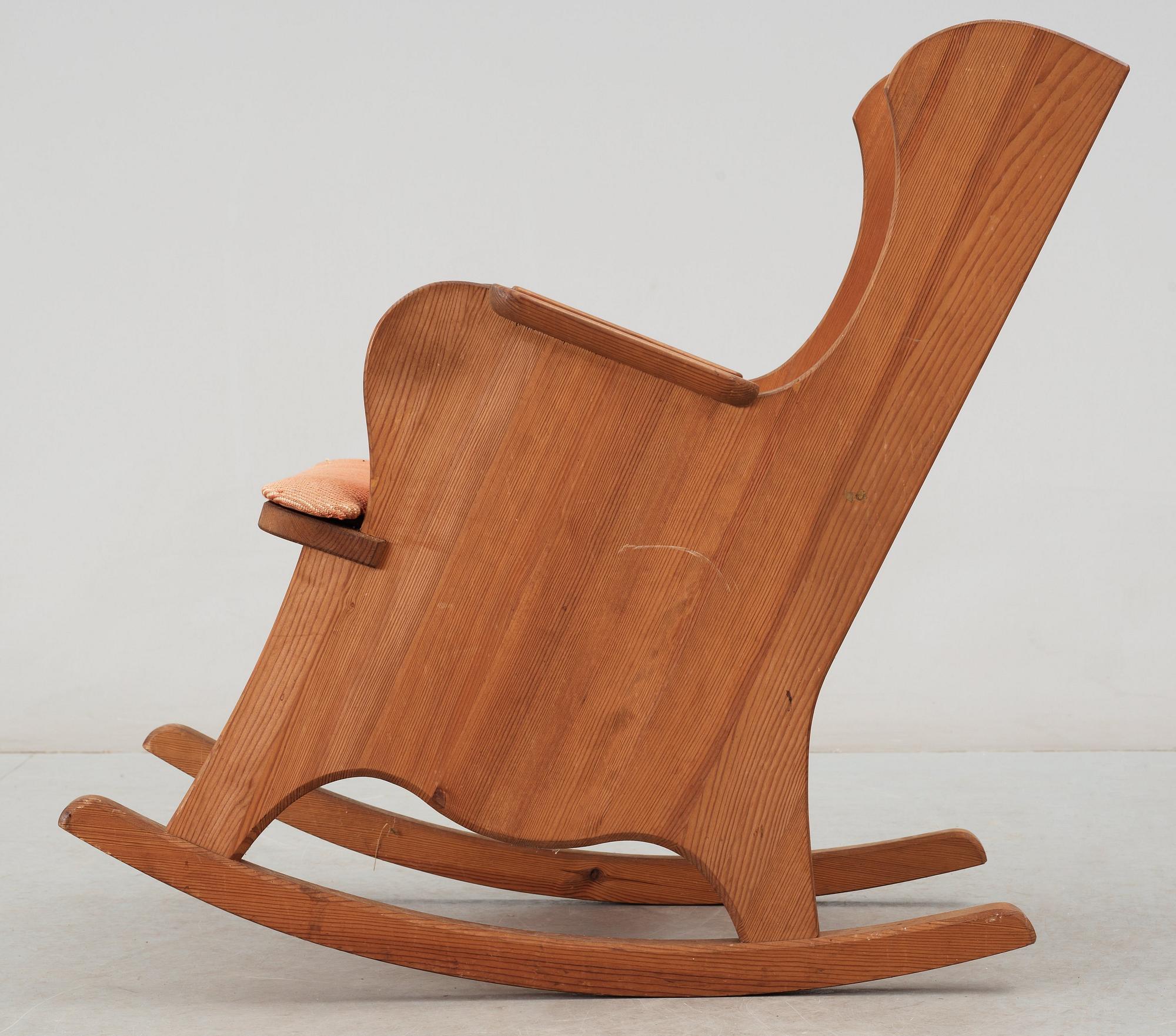 An Axel Einar Hjorth 'Lovö' stained pine rocking chair Nordiska Kompaniet, 1930's.