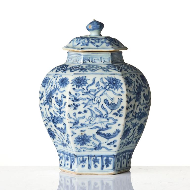 A blue and white faceted 'lotus and birds' jar with cover, Ming dynasty (1368-1644).