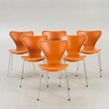 Arne Jacobsen, a set of six Sjuan leather and wood chairs for Fritz Hansen Denmark 2006.