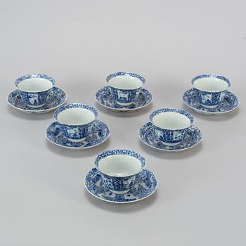 Six Chinese blue and white cups with dishes, early 20th century.