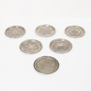 A Persian silver tray, 12 small spoons and six coasters, first part of the 1900s.