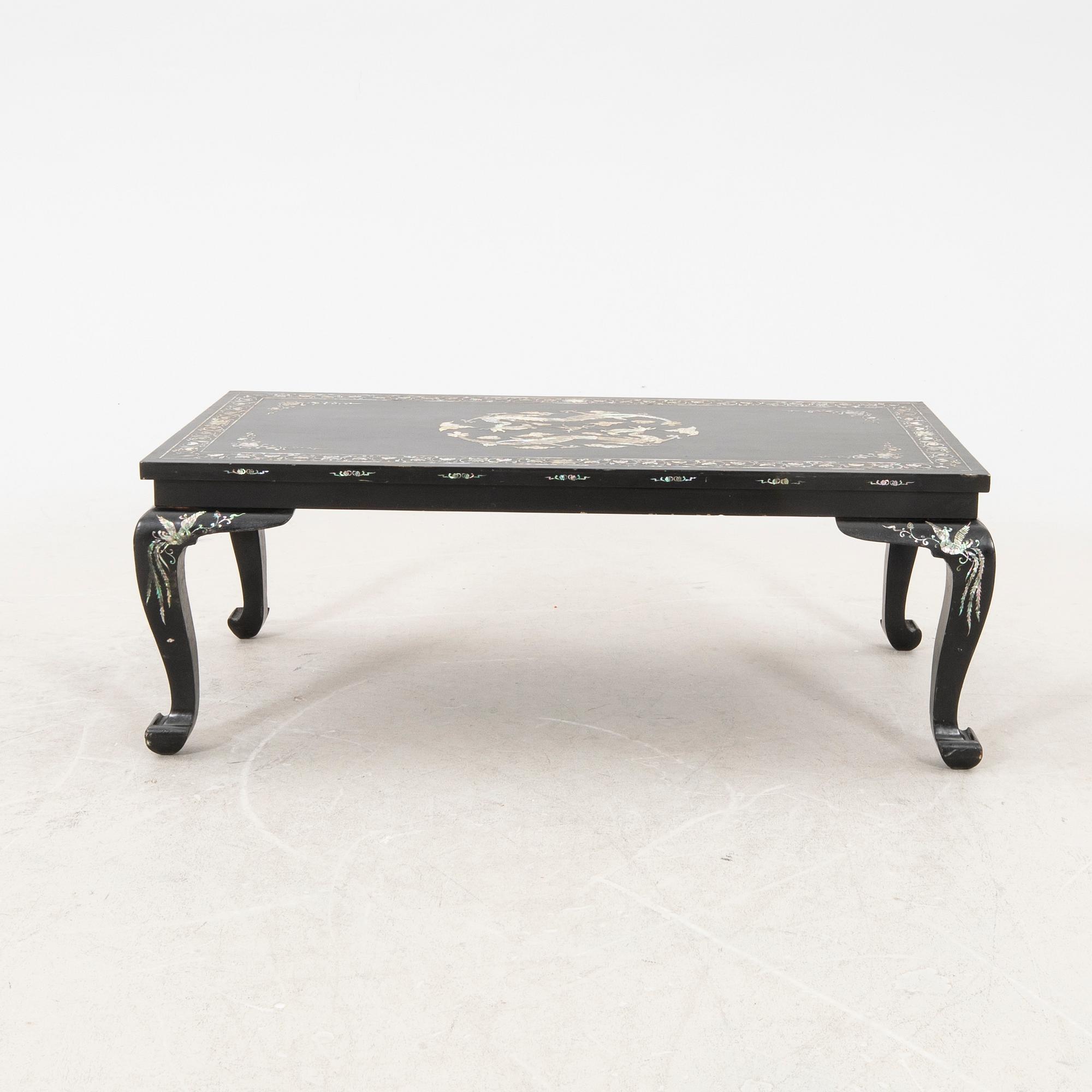 A Chinese lacquered coffee table later part of the 20th century.
