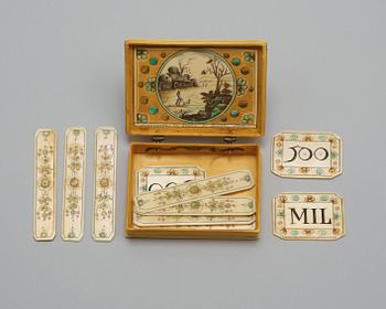 A French 18th century ivory counter box painted in colours signed "Mariaval le Juene a Rouen fecit".