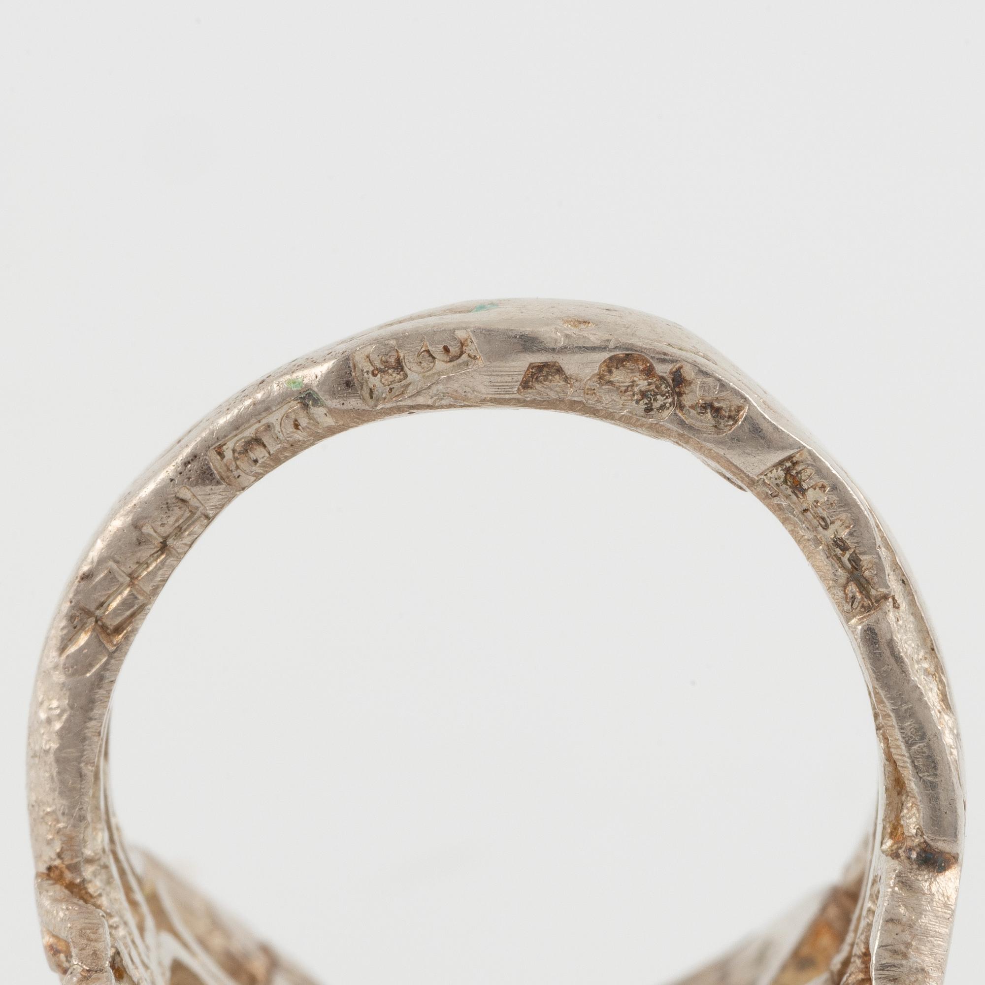 Lars Arby, four rings, sterling silver and enamel, Gothenburg 1966 and 1976.
