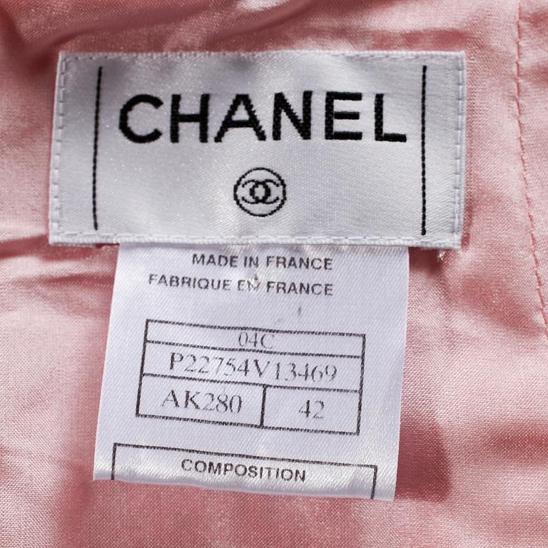 A pink bouclé skirt by Chanel.