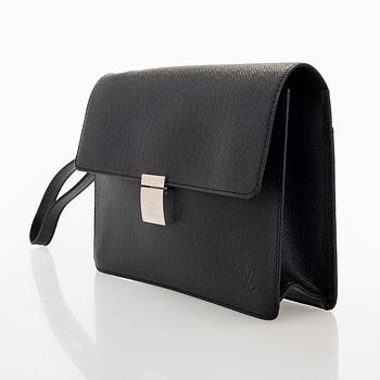 Louis Vuitton, a 'Selenga' clutch bag.