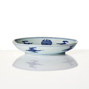 A blue and white 'dragon' dish, Qing dynasty with Yongzheng six character mark and of the period (1723-35).