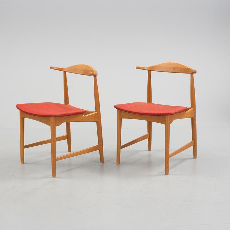 A pair of "Danske" chairs by IKEA.