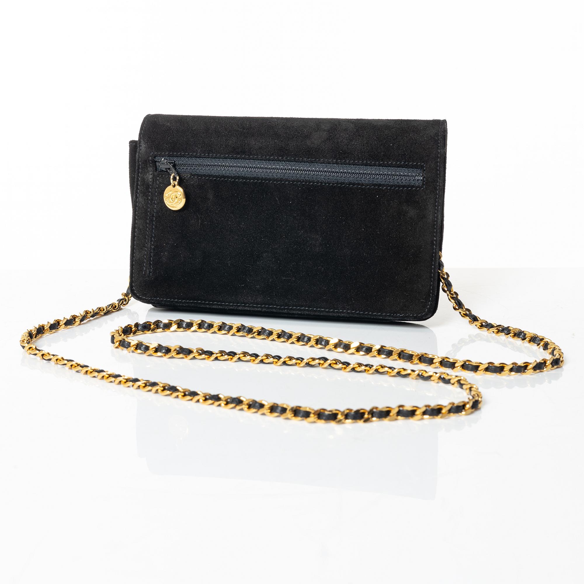 Chanel, A black suede vintage purse / wallet on chain.