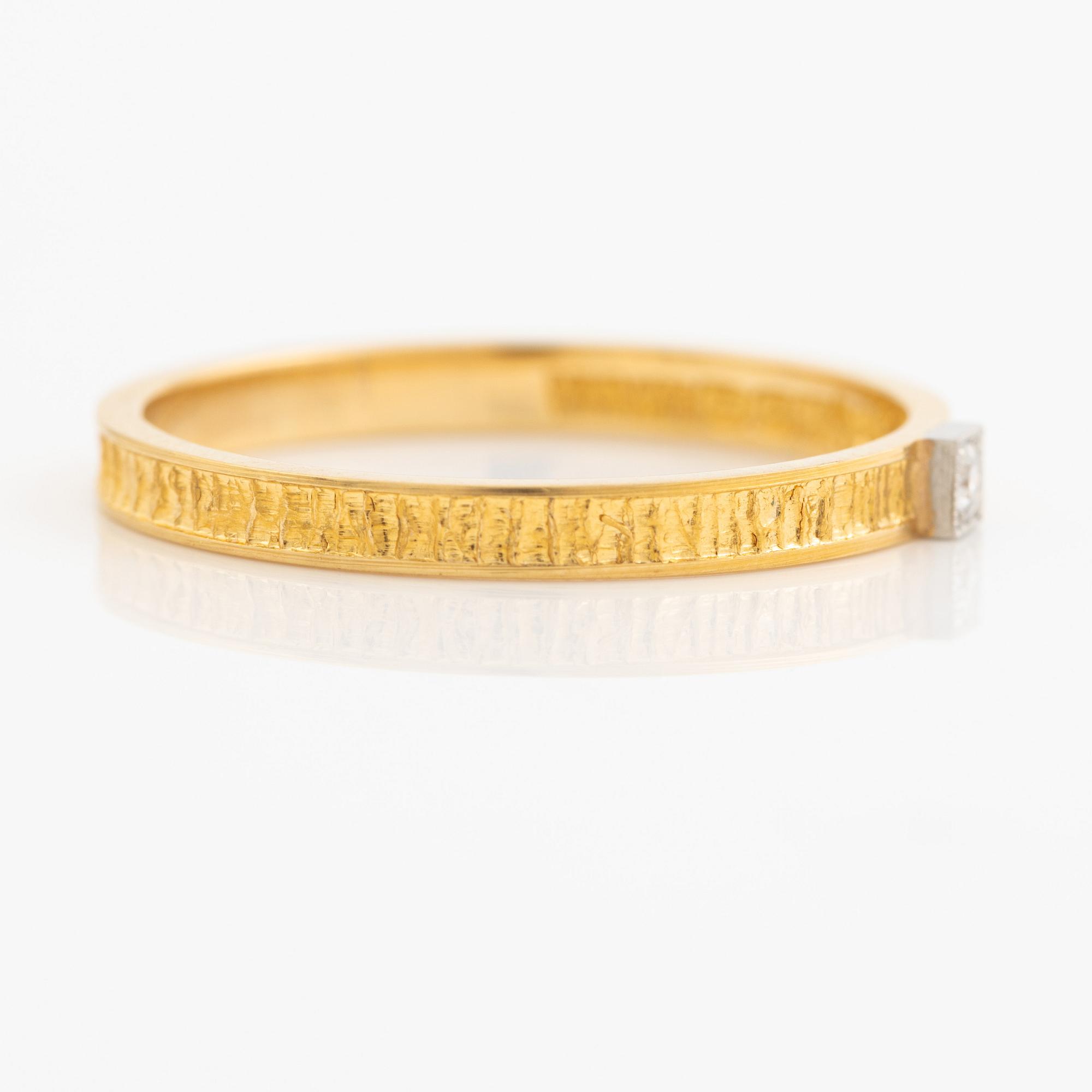 Lapponia ring 18K guld med en åttkantslipad diamant, Finland 1978.