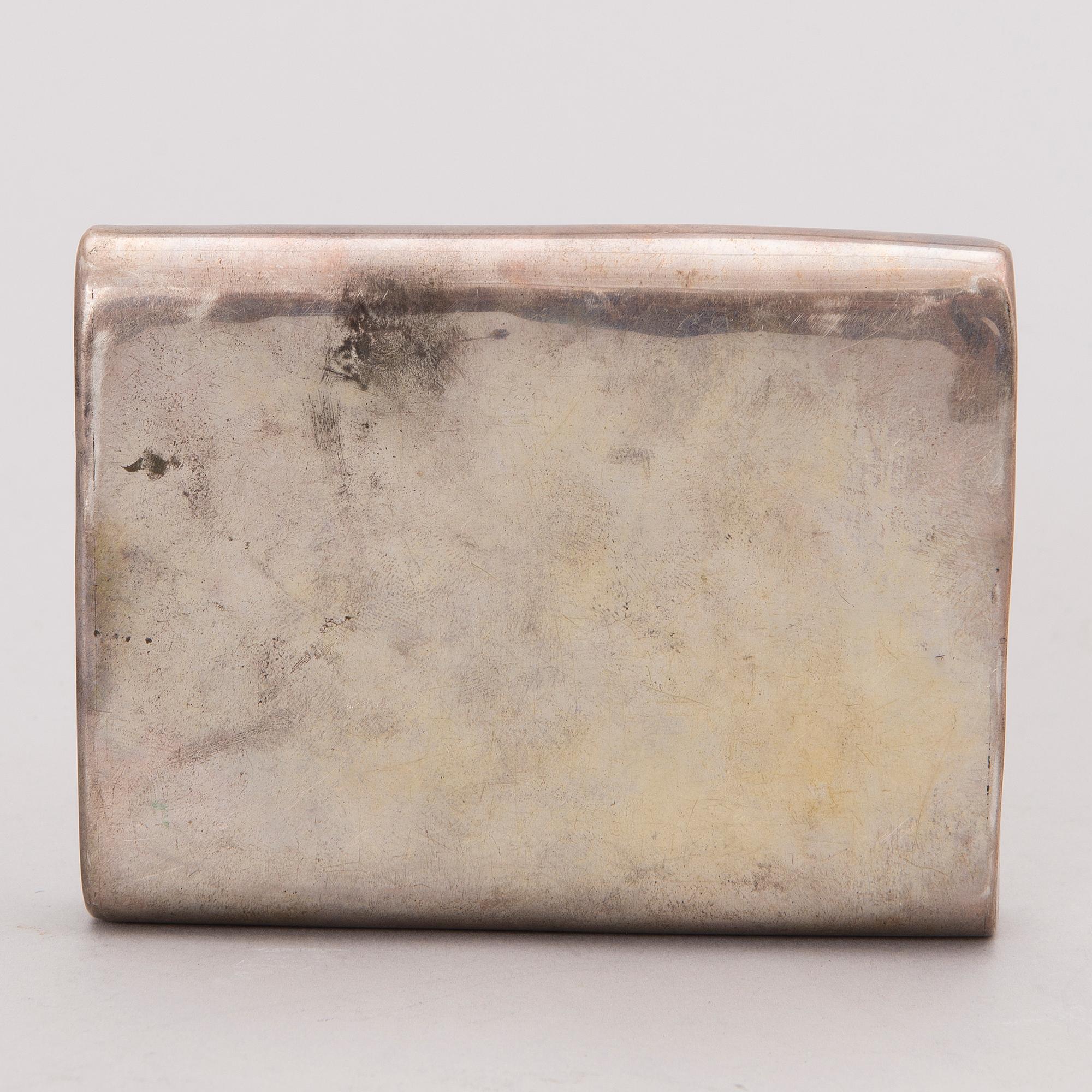 A cigarette case in silver (875) and gold, early 20th Century.
