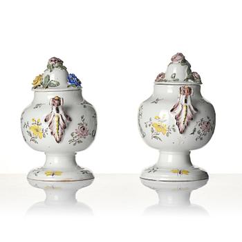 A pair of fainece potpurri jars with covers, Northern Europe, 18th century.