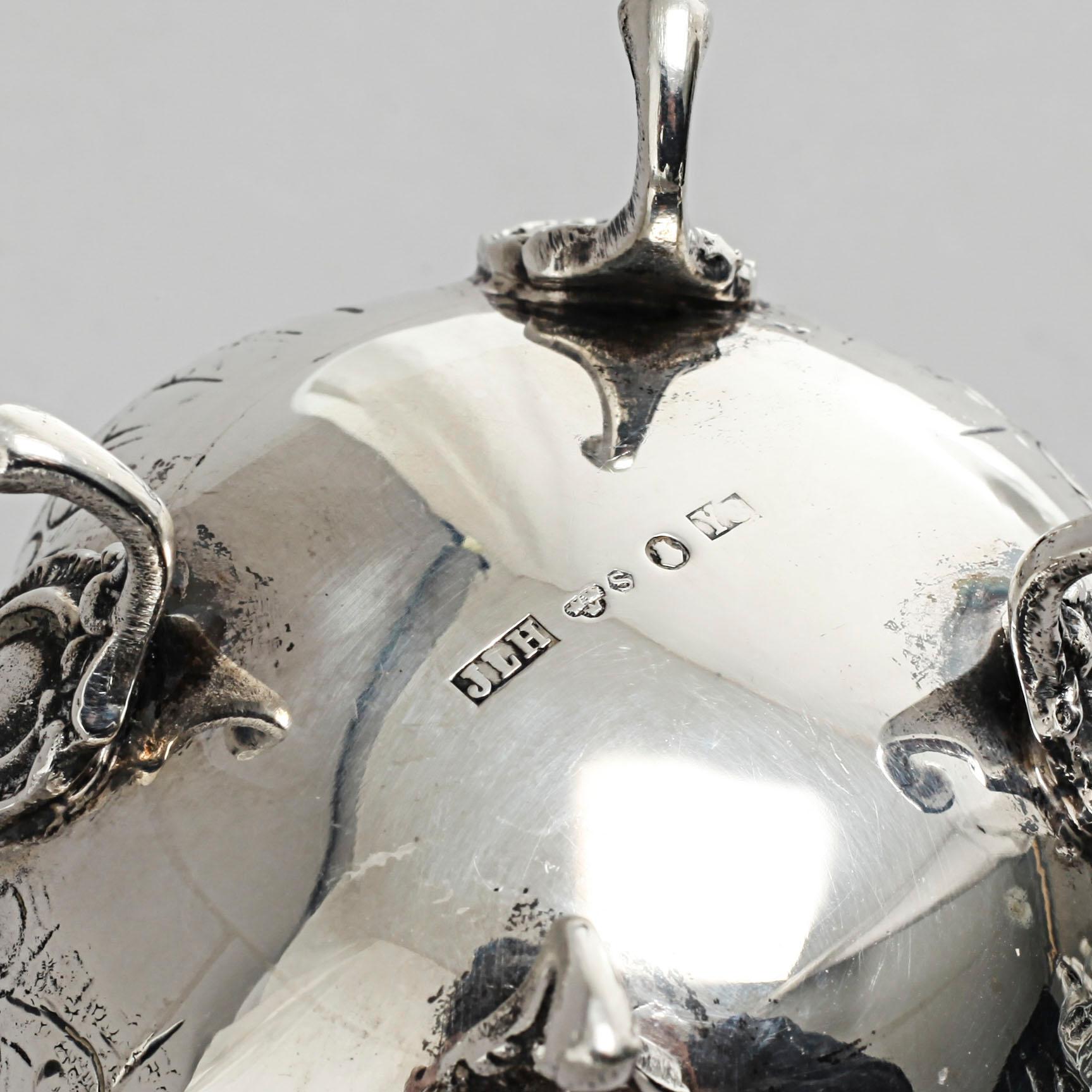 A silver sugarbowl, a cream jug and a tray by J L Hultman, Stockholm, mid 20th century.