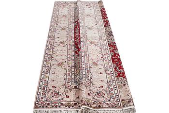 An Esfahan carpet, part silk, signed Rahimi, c. 298 x 206 cm.