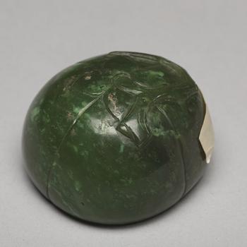 A group of four nephrite objects, Qing dynasty or older.